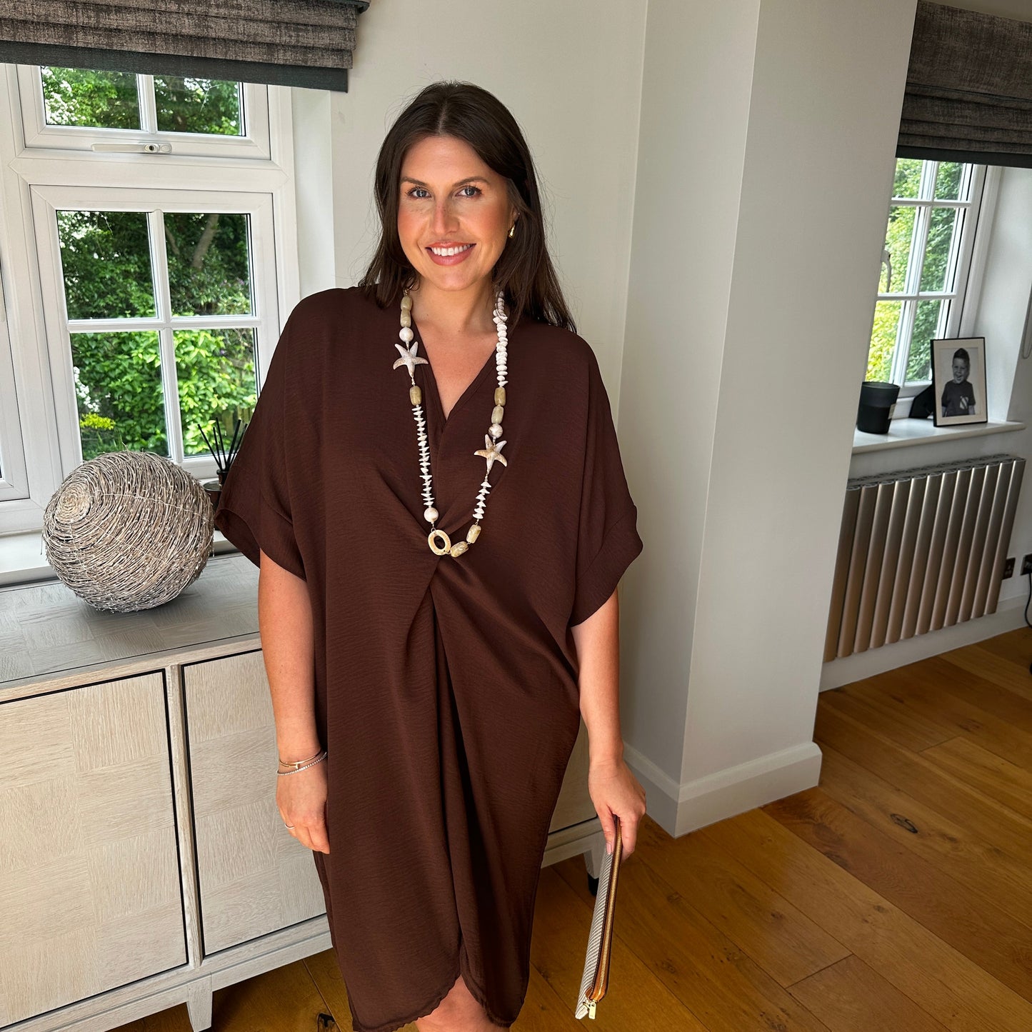 Prenda fluida con detalle anudado