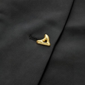 Top Elegante con Detalle Dorado Sofisticado