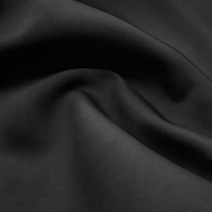 Top Elegante con Detalle Dorado Sofisticado