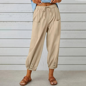 Pantalones Fluidos con Detalles Distintivos
