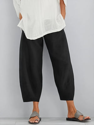 Pantalones Fluidos de Pierna Ancha: Elegancia Relajada