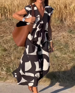 Vestido Maxi Estampado Abstracto: Fluidez y Estilo