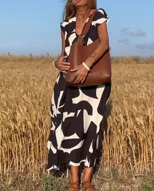 Vestido Maxi Estampado Abstracto: Fluidez y Estilo