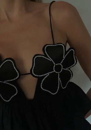 Top con Detalles Florales y Peplum