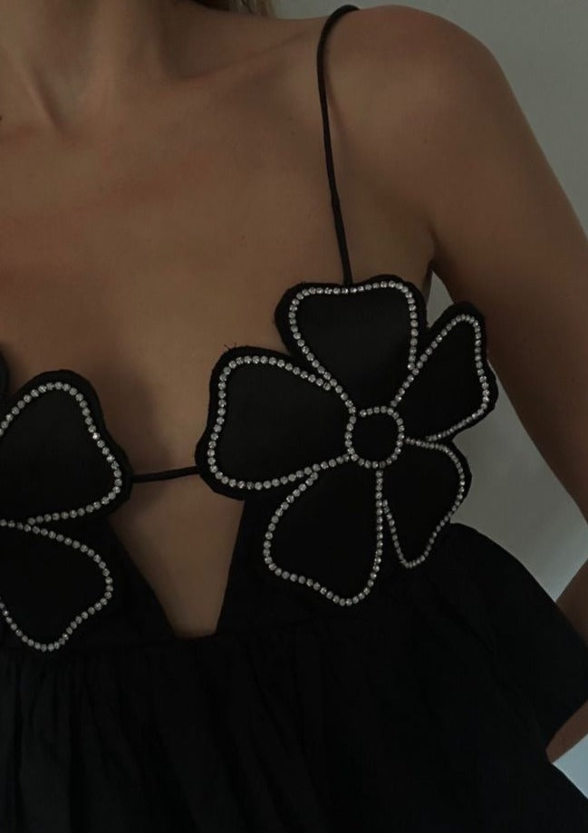 Top con Detalles Florales y Peplum